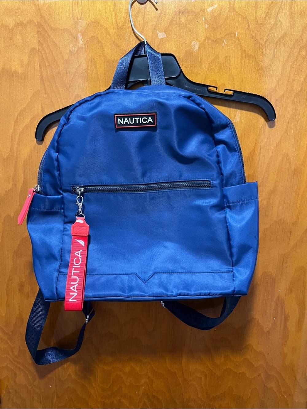 Nautica Navy Blue Mini Backpack with Red Branded Pull